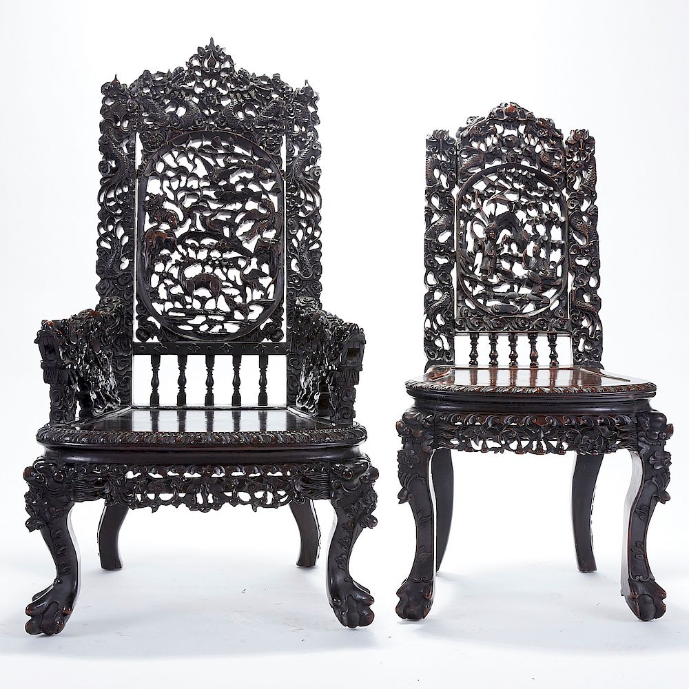 Appraisal: Pair Chinese Export Carved Rosewood Side Chairs A strikingly well