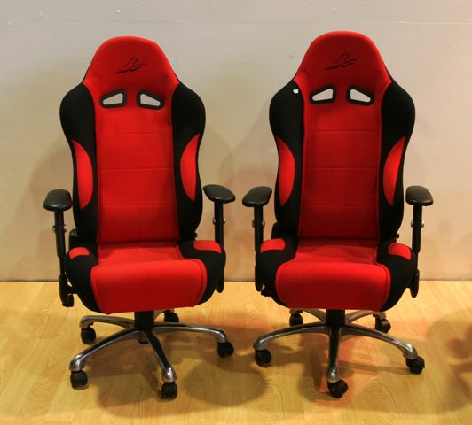 Appraisal: A pair of unusual car-seat office chairs