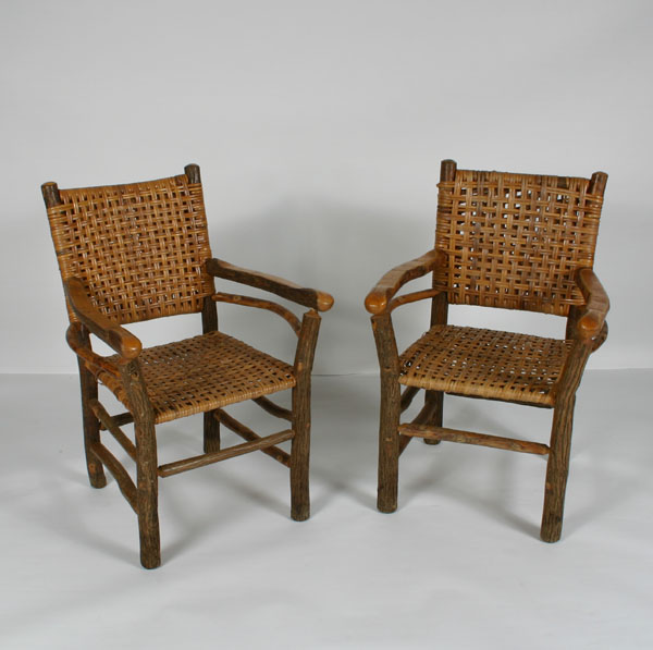 Appraisal: Pair Old Hickory open-weave armchairs chamfered arm rests curved brace