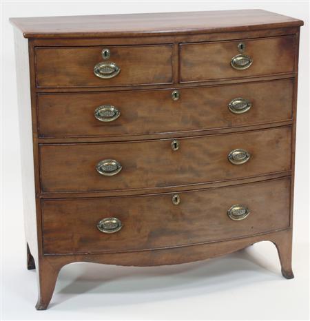 Appraisal: A Regency mahogany bowfront chest the rosewood crossbanded top over