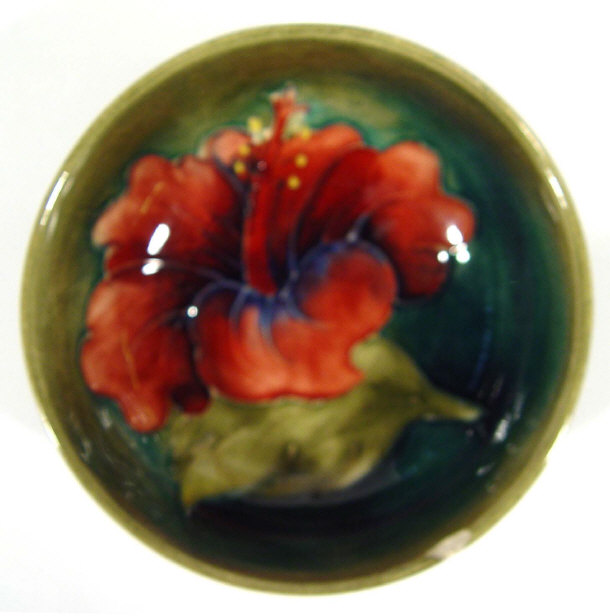 Appraisal: Moorcroft pottery pin bowl hand painted and tubelined with Hibiscus