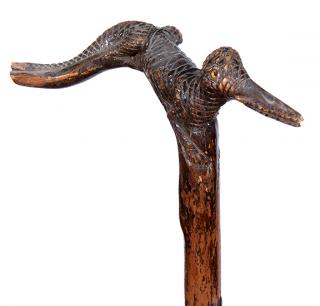 Appraisal: Gooney Bird Folk-Art Cane Ca An unusual carving of a