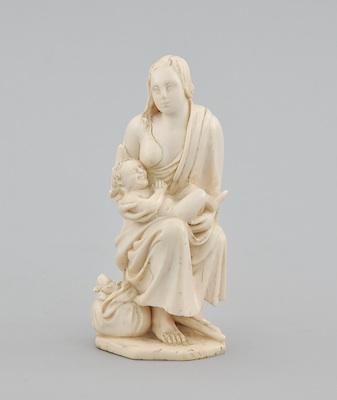 Appraisal: A Continental Carved Ivory Figurine of a Mother and Child