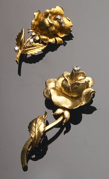 Appraisal: A set of two diamond and gold rose motif brooches