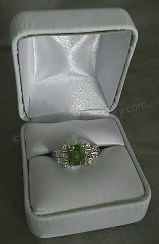 Appraisal: Sterling Silver Emerald Cut Peridot Ring Type Elegant right hand