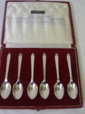 Appraisal: A CASED SET OF SIX TEASPOONS with crown finials each