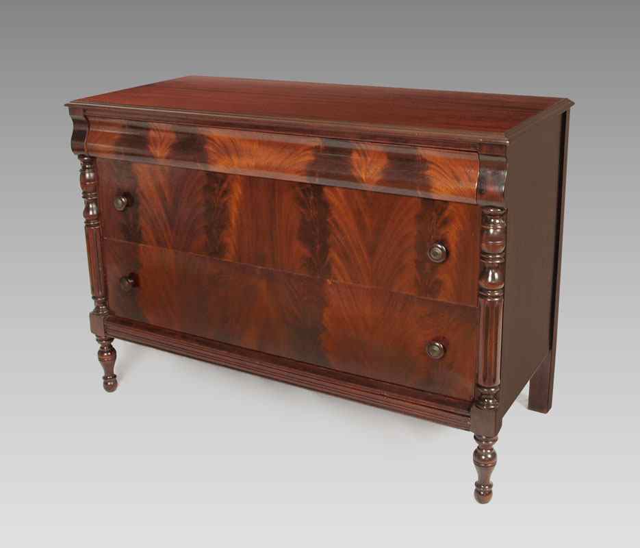 Appraisal: EARLY 'S FLAME GRAIN MAHOGANY VENEERED DRAWER CHEST Empire style