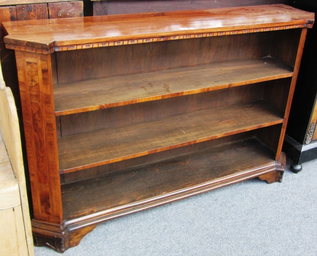 Appraisal: A Continental inlaid walnut floor standing open three tier bookcase