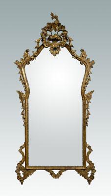 Appraisal: Italian rococo style gilt wood mirror elaborate basket floral and