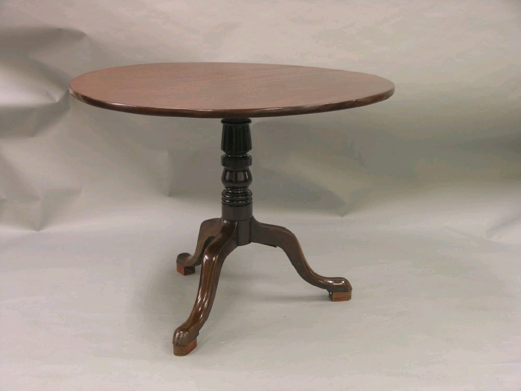 Appraisal: A late Georgian mahogany tripod table circular tilt top on