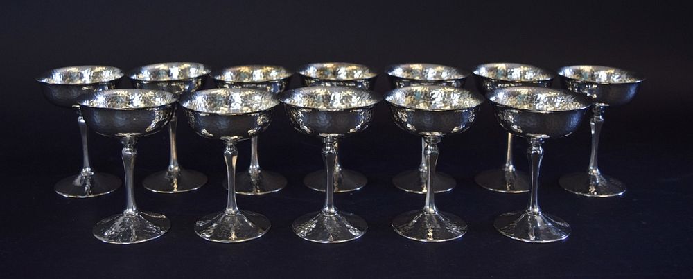 Appraisal: Bernard Rice's Sons Silverplate Champagnes hand hammered silverplate champagne coupes