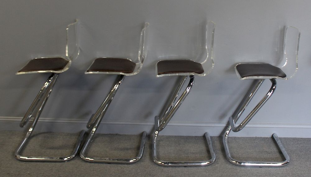 Appraisal: MIDCENTURY Lucite And Chrome Stools Good heavy duty quality From