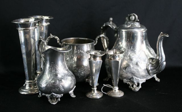 Appraisal: A small pair of Victorian sterling silver tulip vases by