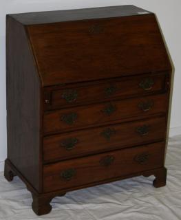 Appraisal: Chippendale mahogany and cedar slant front desk old pierced brass