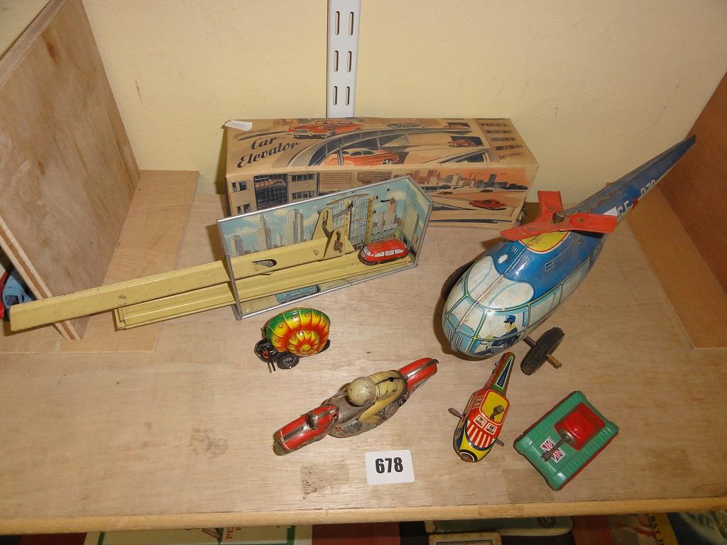 Appraisal: A small collection of s and s tin plate toys