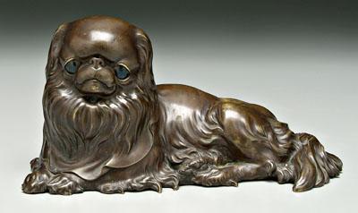 Appraisal: Chinese bronze Pekinese cast recumbent dog with flowing hair brown