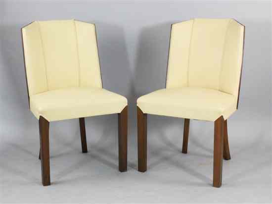 Appraisal: A set of eight Art Deco walnut dining chairs with