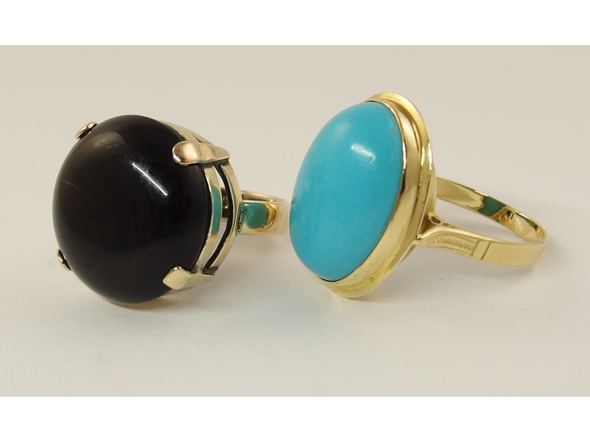 Appraisal: A ct onyx statement ring and a k ring set