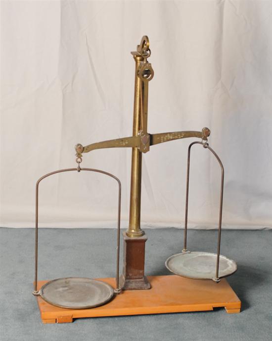 Appraisal: A Large Brass Balance Scale having a tapered column large