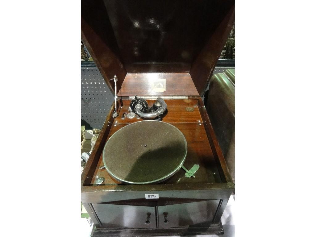 Appraisal: An HMV mahogany cased gramophone with front opening volume doors