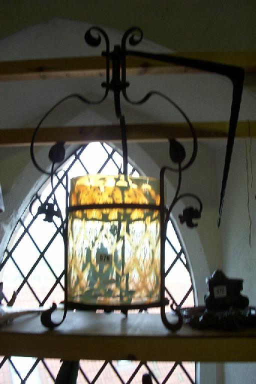 Appraisal: An early th century Vaseline glass hall lantern with ironwork