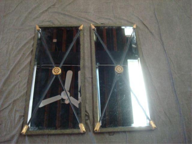 Appraisal: Pair of Patinated Metal Beveled Mirrors with Arrow Accents Dimensions