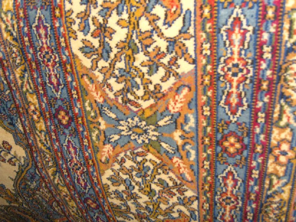 Appraisal: A large eastern wool carpet with Persian style flowering tree