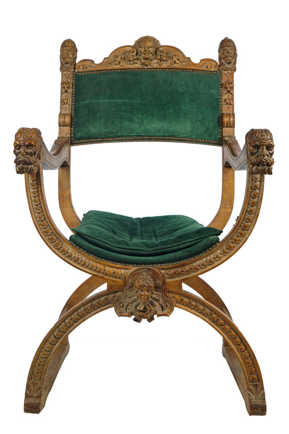 Appraisal: RENAISSANCE REVIVAL CARVED WOOD HALL CHAIRwith green suede upholstery and