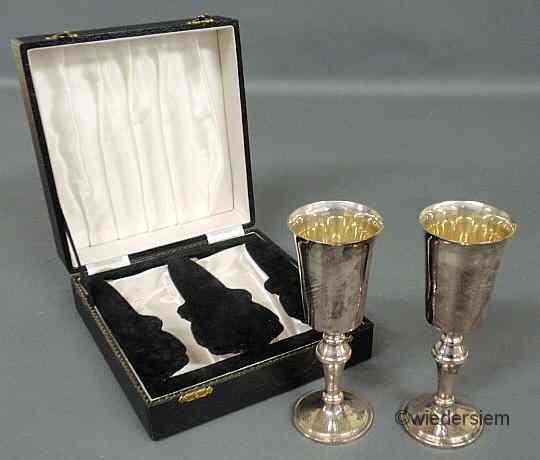 Appraisal: Cased pair of hallmarked English silver small goblets with gold