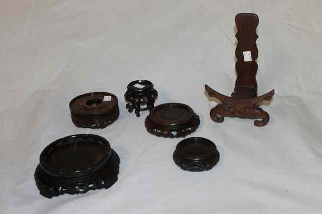 Appraisal: A SELECTIONOF CHINESE HARDWOOD STANDS mostly bowl stands th Century