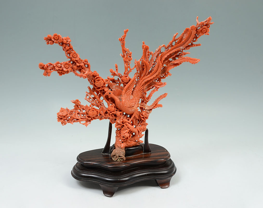 Appraisal: CHINESE CARVED CORAL PHOENIX IN BRANCHES GROUP Carved coral relief