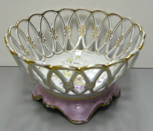 Appraisal: GERMAN KPM PORCELAIN BASKET The openwork sides of intersecting ovals