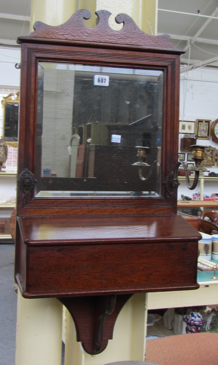 Appraisal: A th century oak hall mirror with pair of candle