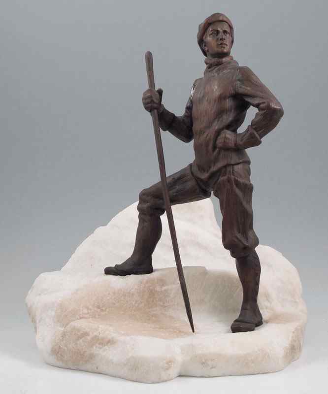 Appraisal: BRONZE AND MARBLE SCULPTURE OF AN ARCTIC EXPLORER Overall measurement