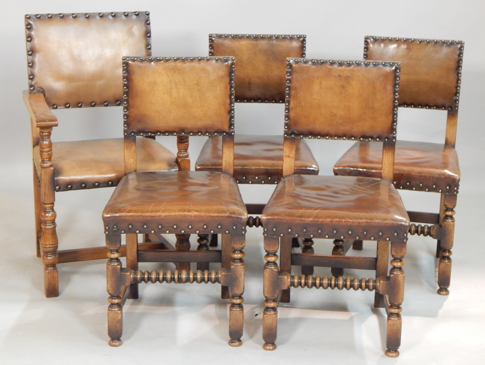 Appraisal: A set of four Titchmarsh Goodwin oak and leather dining