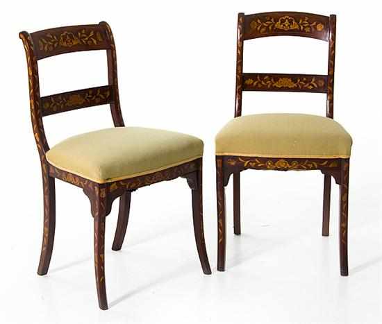 Appraisal: Pair Continental marquetry inlaid mahogany side chairs mid th century