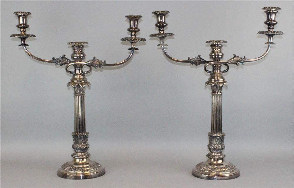 Appraisal: PAIR OF SILVERPLATED THREE-LIGHT CANDELABRA apparently unmarked each with foliate