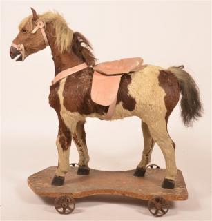 Appraisal: Antique Hyde Covered Horse Riding Toy h x l Good