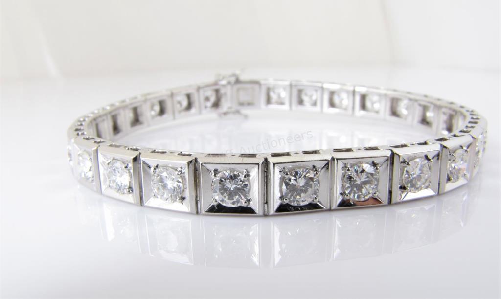 Appraisal: A lady's K white gold tennis bracelet four-prong set in