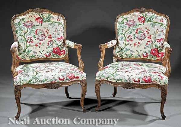 Appraisal: A Pair of Louis XV-Style Carved Walnut Fauteuils each of