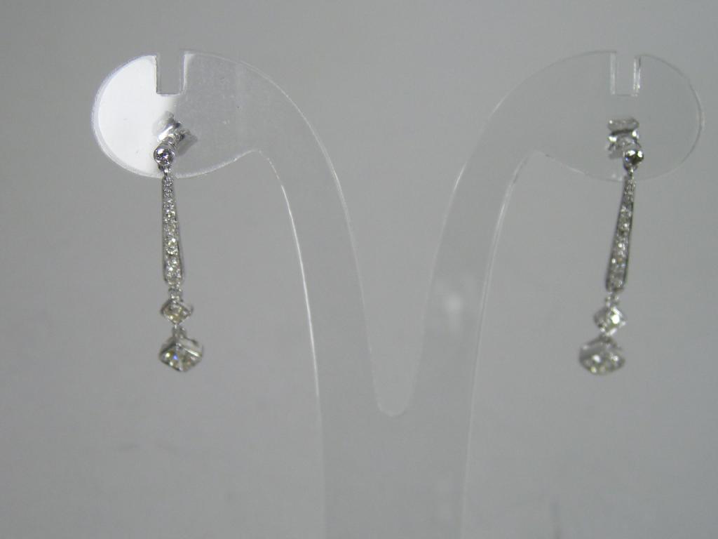 Appraisal: A pair of Diamond Earrings the circular-cut stones suspended in