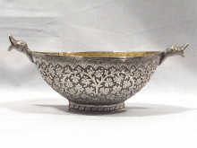 Appraisal: A silver Persian bowl heavily decorated circa weight approx ounces