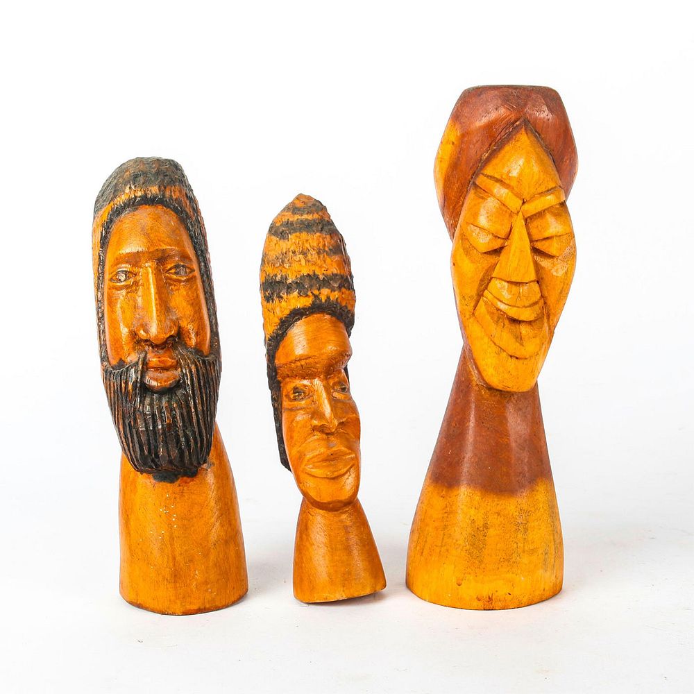 Appraisal: SET OF WOODEN CARVED AFRICAN BUST FIGURES hand carved wooden