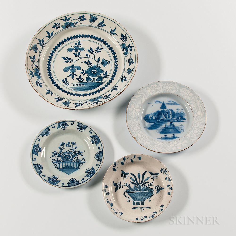 Appraisal: Four Tin-glazed Earthenware Plates Four Tin-glazed Earthenware Plates England and