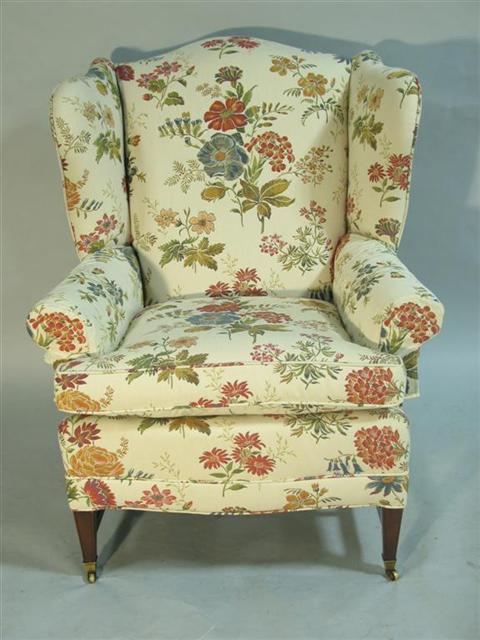 Appraisal: REGENCY STYLE MAHOGANY WING CHAIR th century the floral upholstered