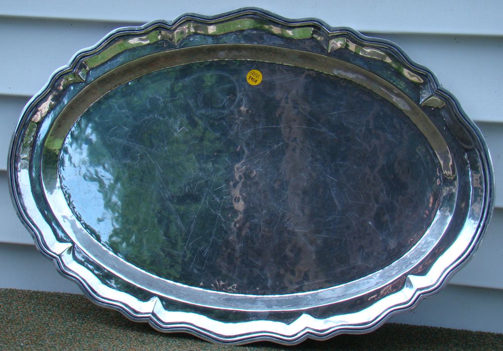 Appraisal: OVAL MEXICAN SILVER PLATTER In hand-hammered colonial-style Marked and Plata