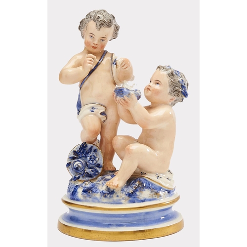 Appraisal: A Royal Worcester group of two children with a nest