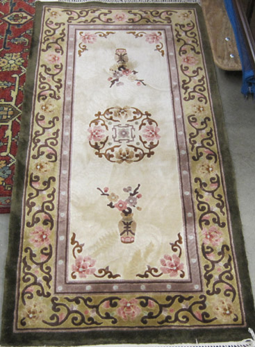 Appraisal: CHINESE SILK AREA RUG hand knotted in traditional Peking design