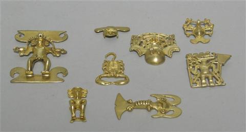 Appraisal: EIGHT PANAMANIAN HUACA FIGURES The gold plated reproductions cast in