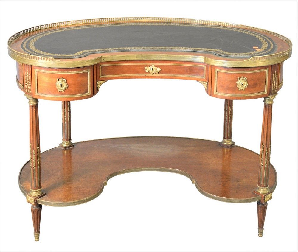 Appraisal: Louis XVI Style Kidney Shaped Mahogany Writing Table having ormolu